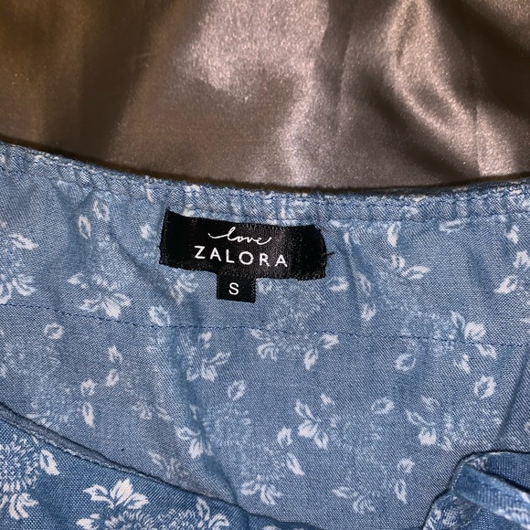 blue romper with white floral patterns - Picture 4 of 4